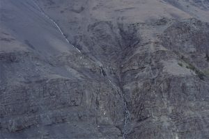 The upper section of Todagin slope channel complex, showing back-stepping channel stacking and channel margin pinchouts. Bowser Basin, British Columbia.