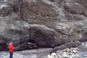 Thick, poorly bedded debris flows in Middle Eocene alluvial fans that accumulated outboard of rising thrust belt during the Eurekan Orogeny, Axel Heiberg Island (Arctic Canada).  Source rocks consist of various Triassic and Jurassic sandstones and diabase.