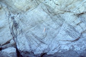 Trough crossbedded sandstone in low sinuosity channels (braided) in the Middle Eocene Buchanan Lake Fm, Axel Heiberg Island (Arctic Canada).  These channels are the more distal equivalents to syntectonic, gravelly braided river deposits (Eurekan Orogeny).