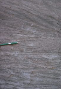 Multiple sets of climbing ripples, Middle Eocene Buchanan Lake Fm, Geodetic Hills, Axel Heiberg Island. These form when a significant suspended load of fine sand settles and becomes part of the bedload  on the channel floor.