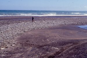 Gravel bar formed at the intersection of a high energy West coast New Zealand beach, and the Tangahoe River mouth