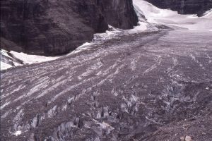 Lateral moraine and crevasses at the Valley of the Six Glaciers, Lake Louise, Alberta. Glacier flow is to the left.