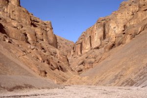 Thick, Eocene, syntectonic gravelly braided river deposits (Buchanan Lake Formation; Franklin Pierce Bay, Ellesmere Island). Sediment was shed from evolving thrusts during the Mid-Late Eocene (?) Eurekan Orogeny