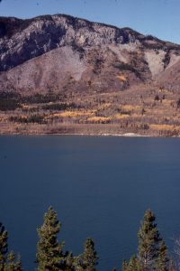 Lower Paleozoic carbonates have been thrust over Upper Cretaceous foreland basin strata (approximately east- right-dipping bedding visible at top right), Kananaskis, Alberta Basin. The U. Cretaceous units accumulated during an earlier phase of thrusting, farther west, and then were subsequently over-ridden.