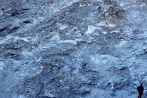 Intensely deformed anhydrite in the hanging wall of Stolz Thrust, Axel Heiberg Island. It is likely anhydrite debris was shed with the coarse sediment, but did not survive the first cycle of transport and deposition.