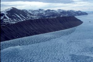 Aerial view of Middle Eocene, syntectonic alluvial fan - braidplain conglomerate outboard of thrusted uplands. Emma Fiord, Ellesmere Island.