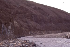 Thick, crudely bedded debris flows and sheet flood alluvial fan conglomerates, probably close to sediment source. Diabase clasts up to a metre wide. Middle Eocene, Geodetic Hills, Axel Heiberg Island.