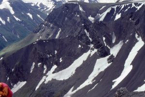 Some fan Deltas in Bowser Basin, migrated to the shelf-slope break, and were probably instrumental in supplying gravel to the deeper basin submarine gullies, canyons, and submarine fans. Here, foreset toes interfinger with slope shale and thin sandstone. West of Tsatia Mt.