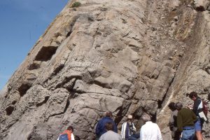 Thick submarine fan channel sandstone (left) overlying fine-grained overbank facies, indicates migration of the channel thalweg. Point San Pedro, California.