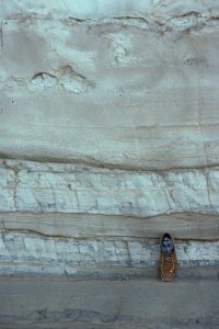 The thicker, upper unit is is a laminated Tb Bouma interval with mudstone rip-up clasts, and a partly eroded-disrupted Td interval at the top - traced laterally this unit becomes composite.  The thick mudstone beds are probably a combination of Td,e.  Takapuna Beach, Auckland.