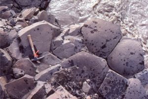 Strand Fiord volcanics, an Upper Cretaceous unit on Axel Heiberg Island, Canadian Arctic. A bird's-eye view of 4, 5 and 6-sided columns.