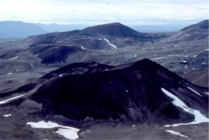 The Mount Edziza volcanic field in Stikine, northern British Columbia began erupting 7.5 million years ago, and continued into the Pleistocene. It features large stratovolcanoes, calderas and cinder cones.