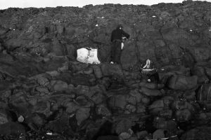 Small lava tube that acted as a feeder to the pillow lavas. Lava in the tube must have drained, leaving an open tube that was subsequently filled by very coarse calcite crystals.