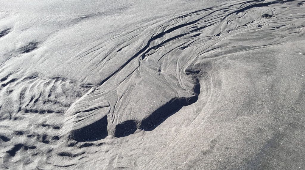 Overlapping micro fan deltas abandoned by the tide. Field of view about 1.5 m.