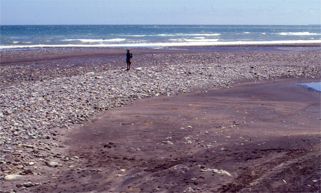 Gravel, or mixed gravel-sand beaches and bars are common at river mouths like this one - Tangahoe River on the north Taranaki coast, New Zealand. In this case gravel is sourced from the river. However, most of the sorting, rounding, and redistribution of gravel clasts takes place under continuous wave wash across the beach.