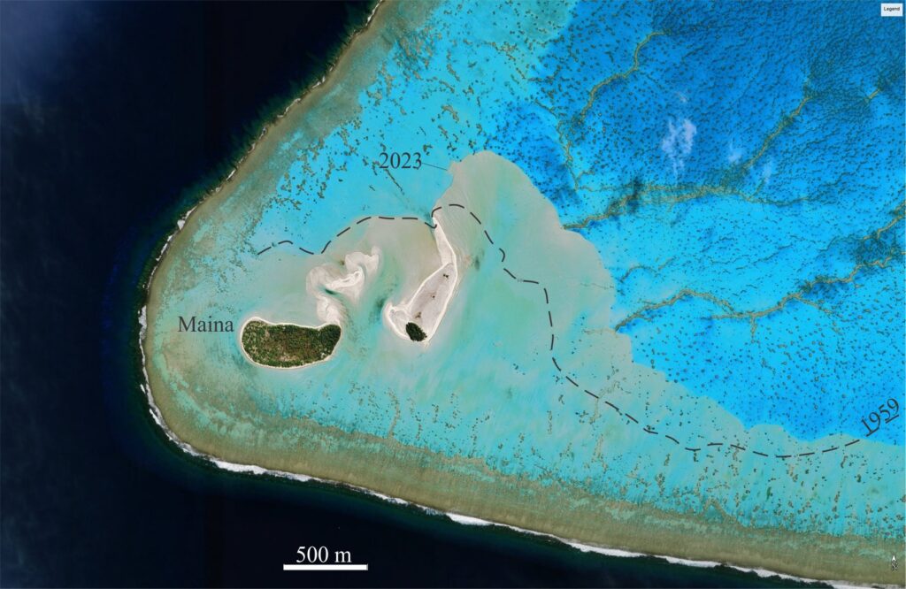 Satellite image of the southwest corner of the Aitutaki lagoon. For scale Maina Island is about 600 m long. The actively prograding margin of the reef apron stands out against the blue lagoon. White patches around the islets represent exposed or nearly exposed apron sands. The dashed line shows the approximate apron margin in 1959 (from Summerhayes, 1971, op. Cit.); the margin in 2023 (the image date) shows up to half a kilometre of progradation into the lagoon. Modified from Google Earth.